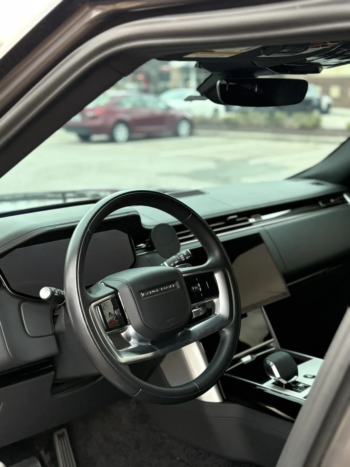 Interior of a car that was recently detailed showing a clean steering wheel and dashboard