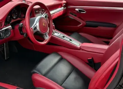 Red Porsche interior after being detailed