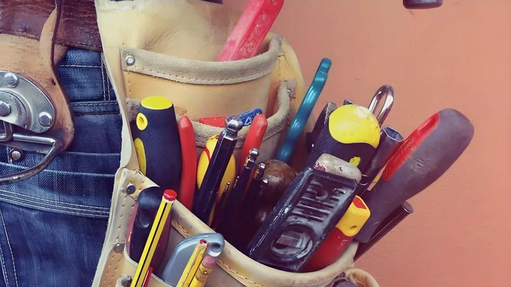 San Marcos Handyman wears his toolbelt.