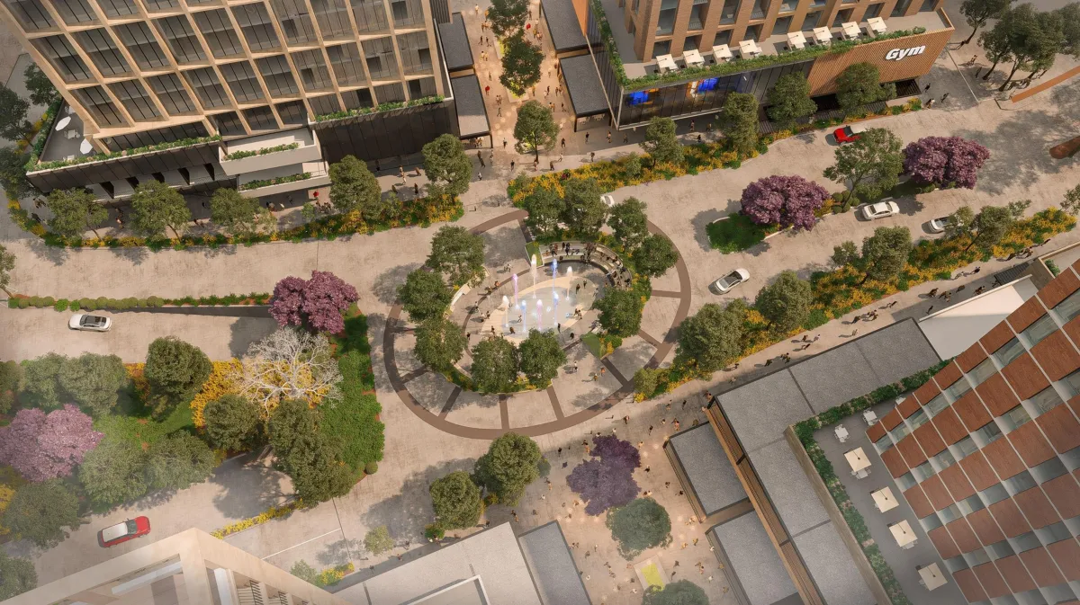 a tall building with balconies against a blue sky