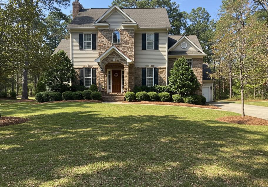 Vibrant green Atlanta lawn just mowed with healthy grass and neat borders