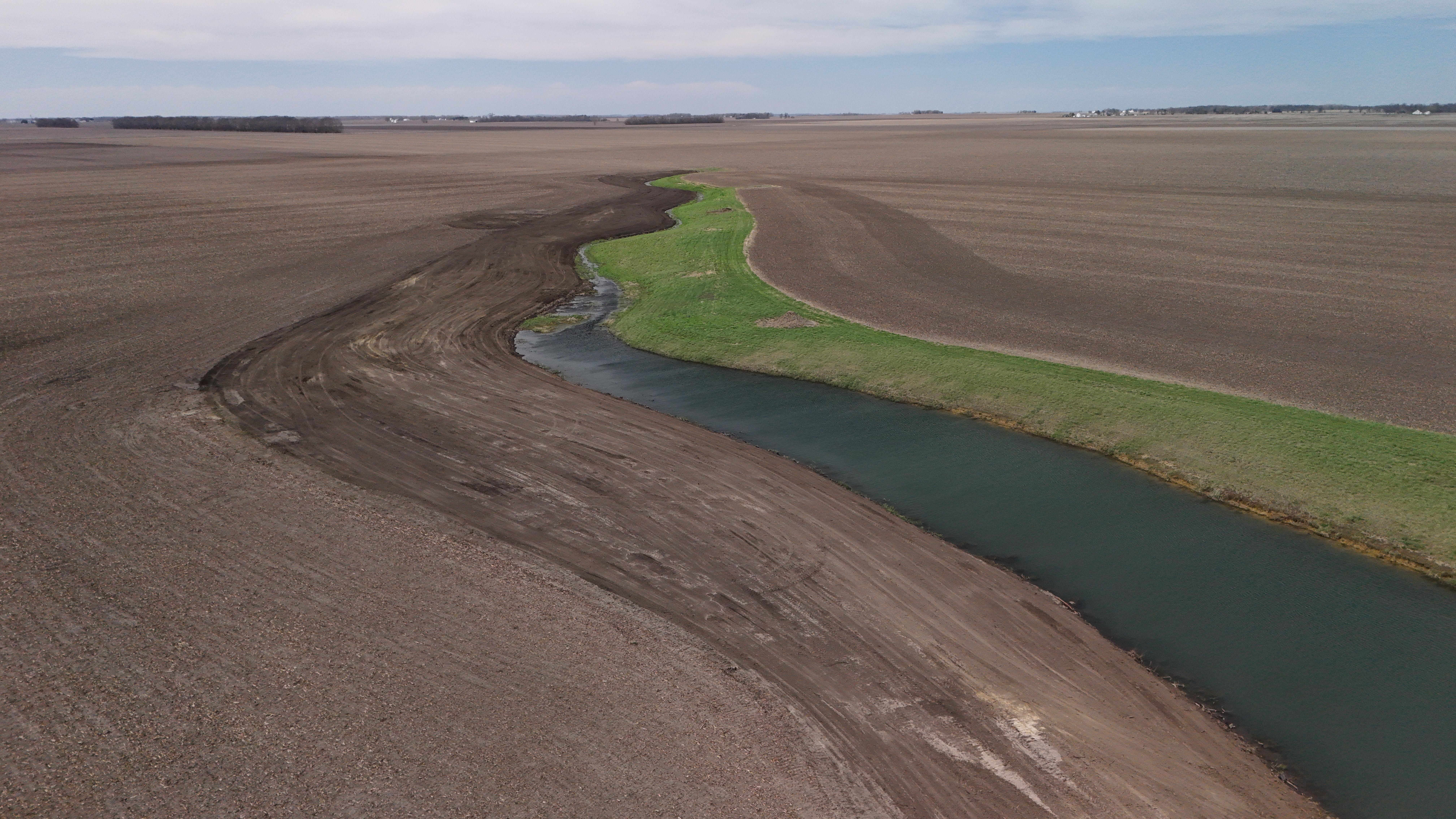 Field drainage work by Custom Property Solutions on Illinois farm property