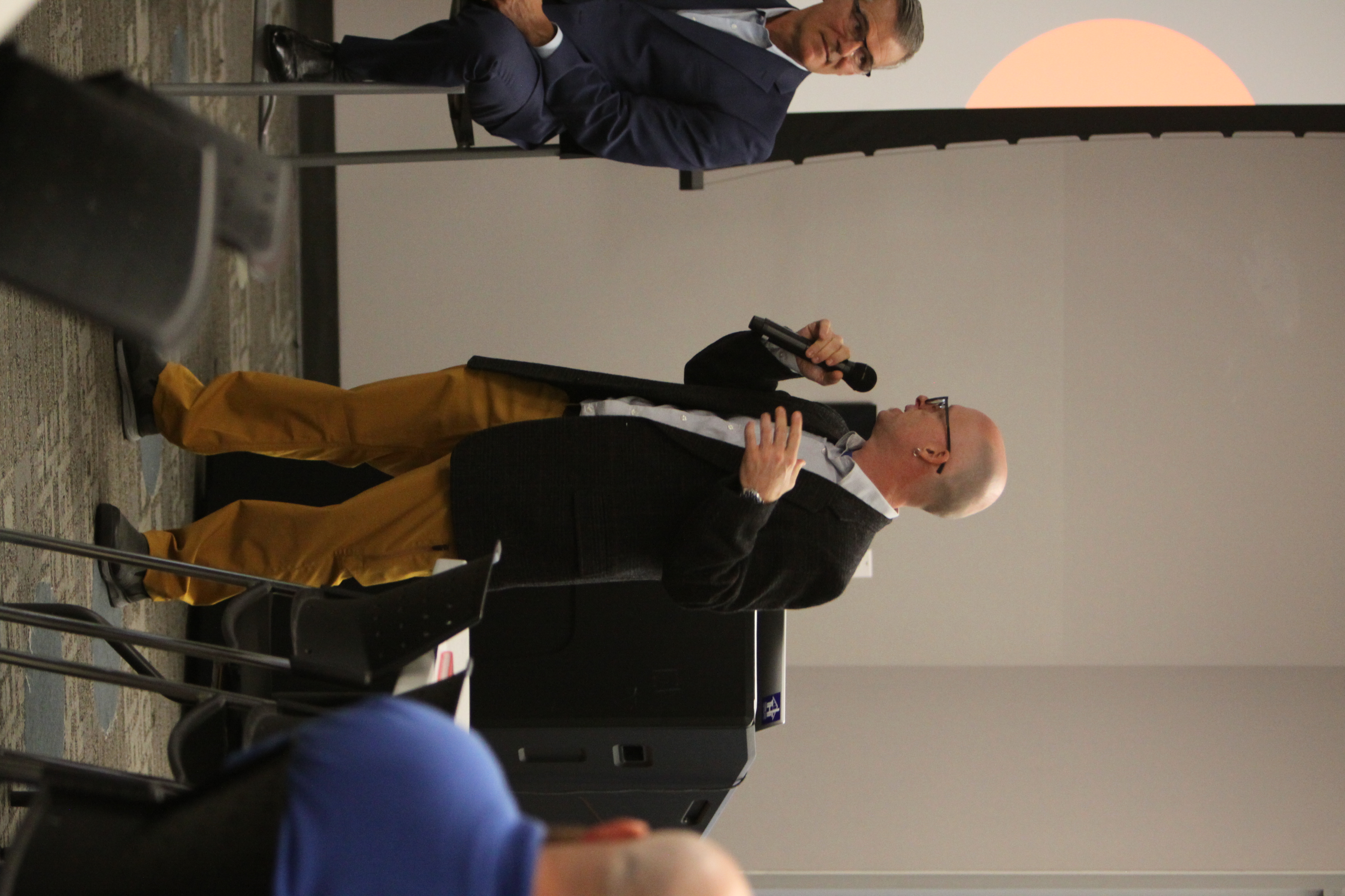 Aaron Schroer speaking at the Downtown Nashville Trade Hub business networking event.