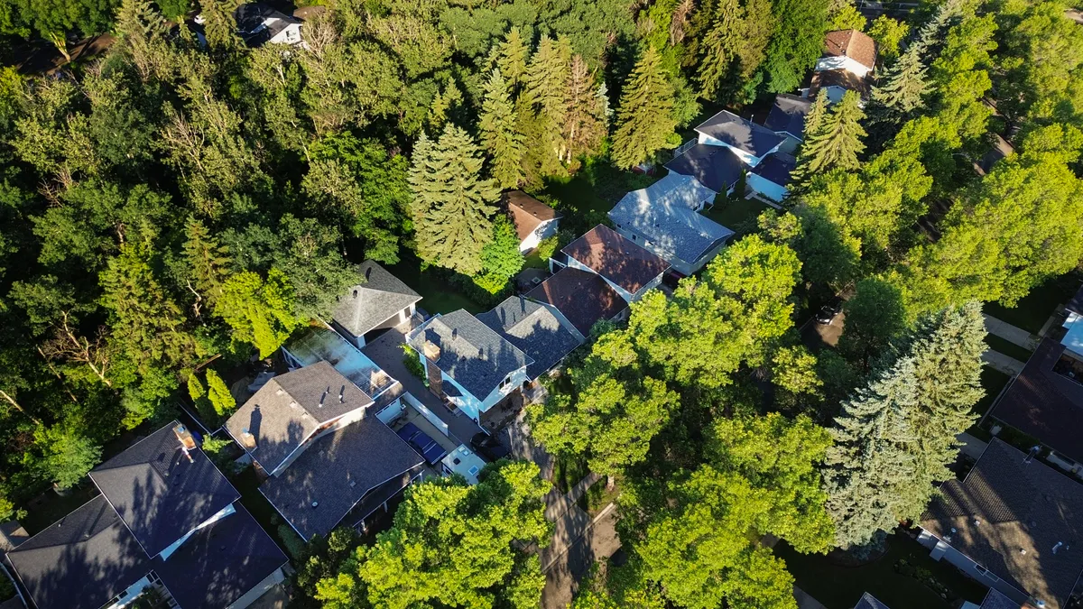 Braeside, St. Albert solar installation with mature tree cover.