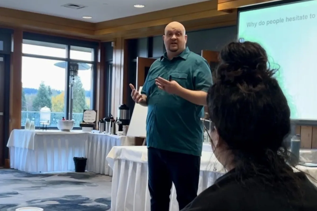 Simon delivering workplace first aid training to a group