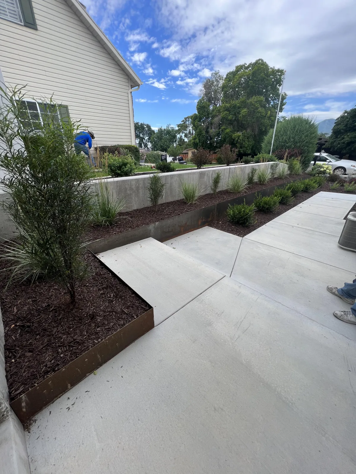 custom planter boxes in front of a beautiful home