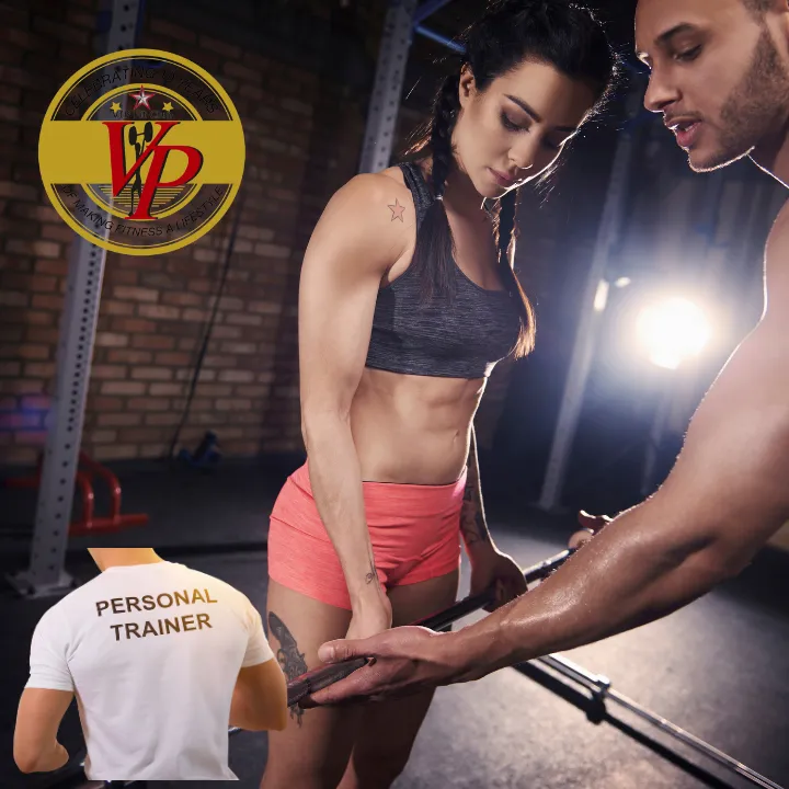 man in black long sleeve shirt and black pants carrying black dumbbell