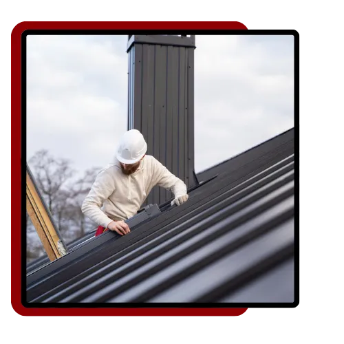 Roofing team completing asphalt roof installation with care