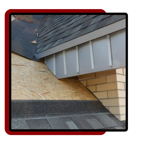 Roof repair crew protecting a San Francisco home after storm damage