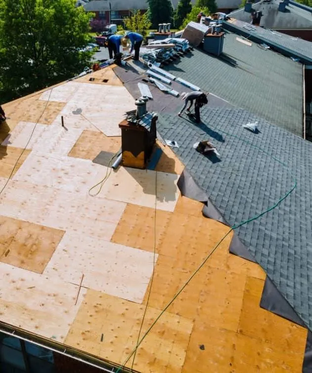 a group of roofers on roofing installation