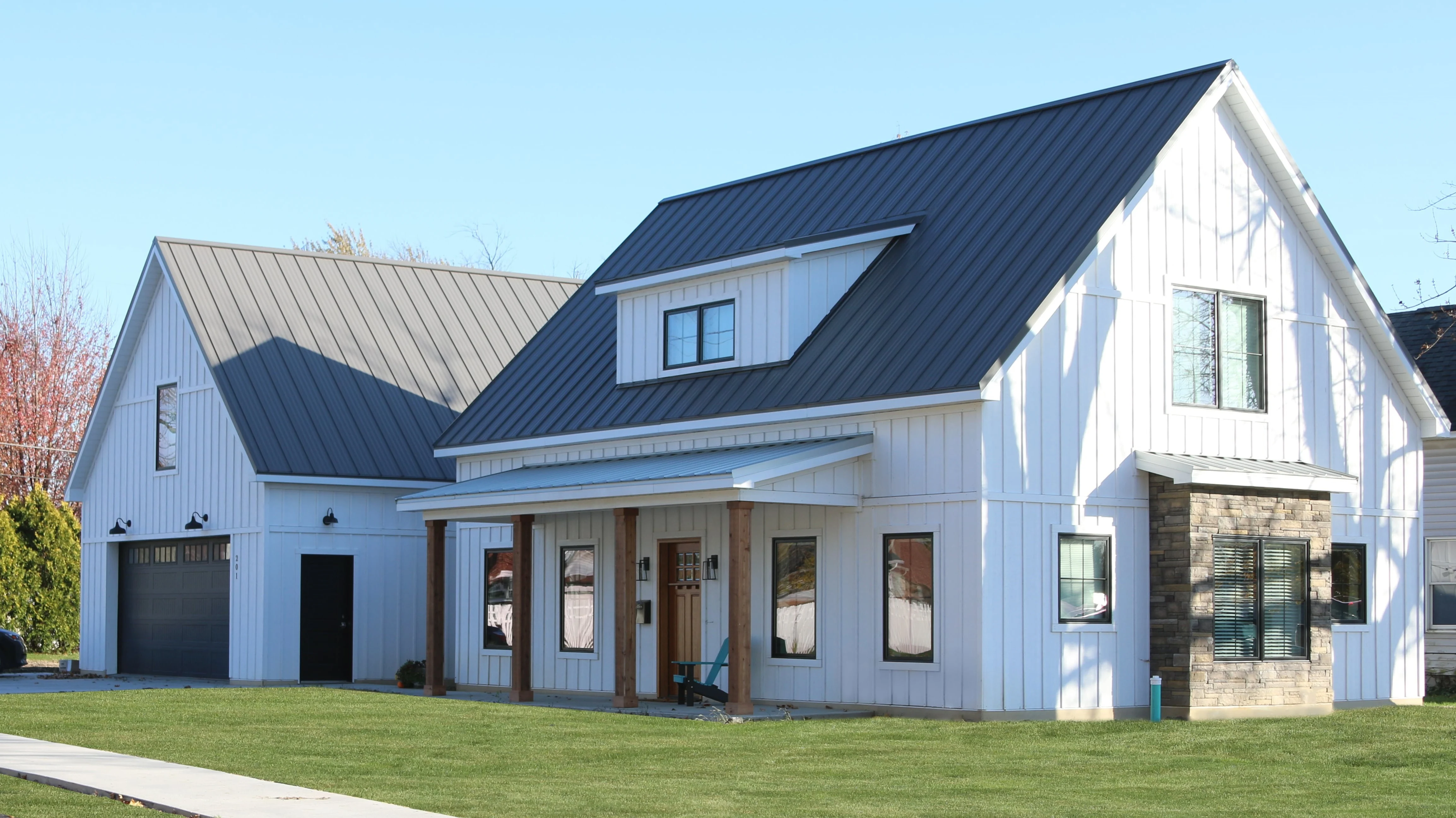 a beautiful house with metal roofing