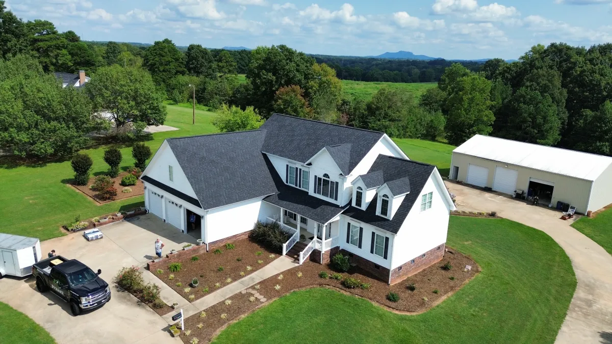 a newly installed shingle roofing