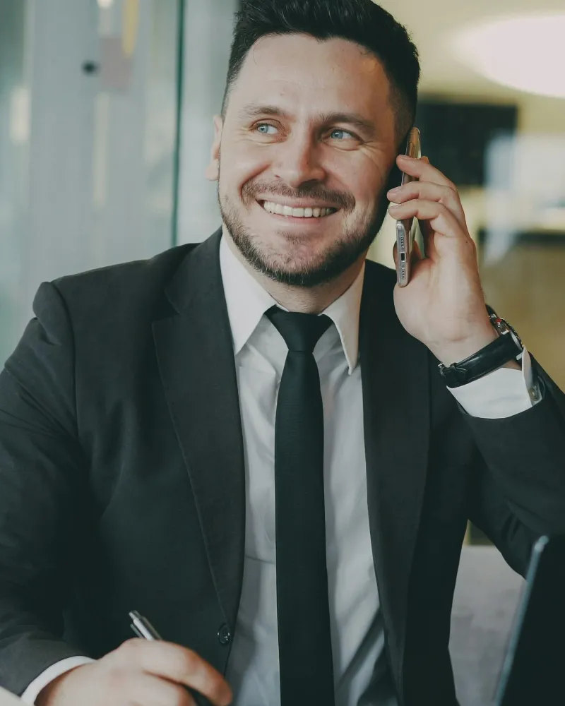 Happy salesperson with a coffee