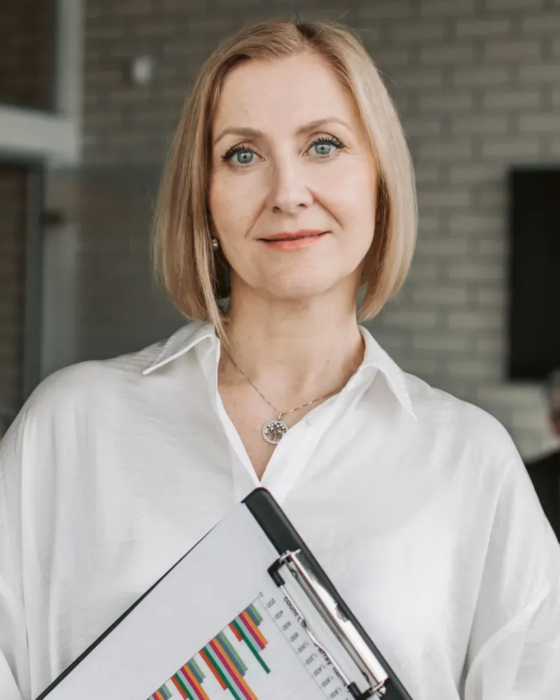 Happy salesperson with a coffee