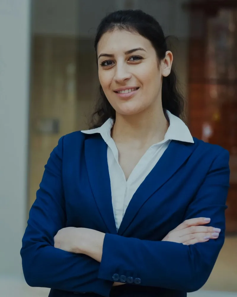Happy salesperson with a coffee