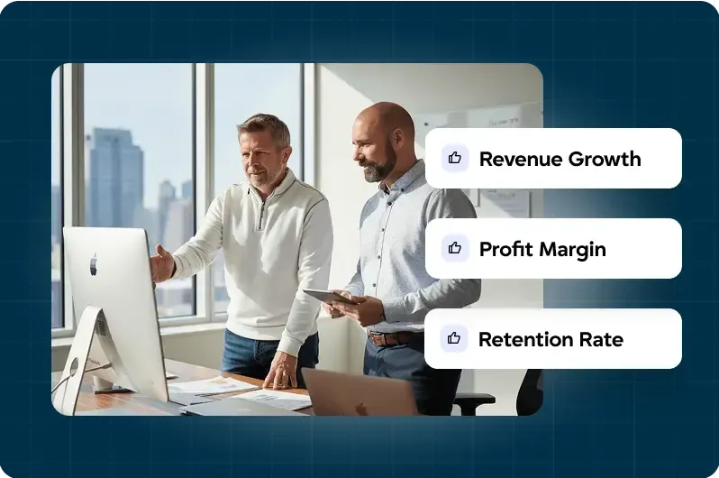 Business coaches analyzing revenue growth profit margin and retention rate metrics on desktop