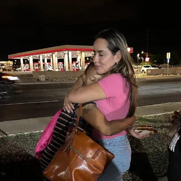 person writing on white paper