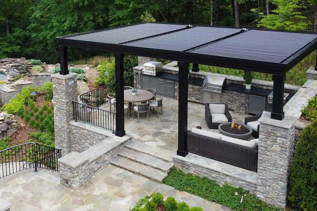 Custom backyard pergola installation featuring a stylish outdoor living space designed for shade, comfort, and entertainment. The pergola complements the home's architecture while enhancing the patio area with functional outdoor gathering space and increased property value.