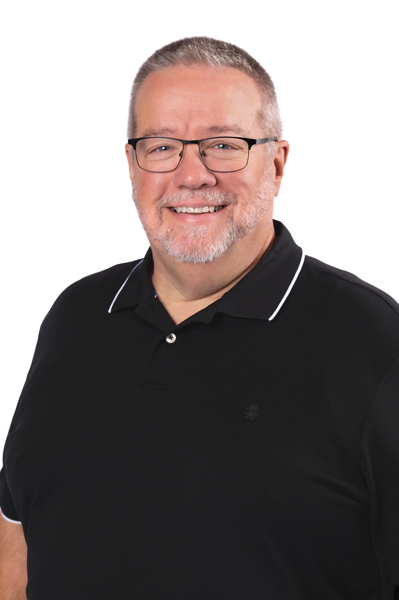Professional headshot of Ray Riddle