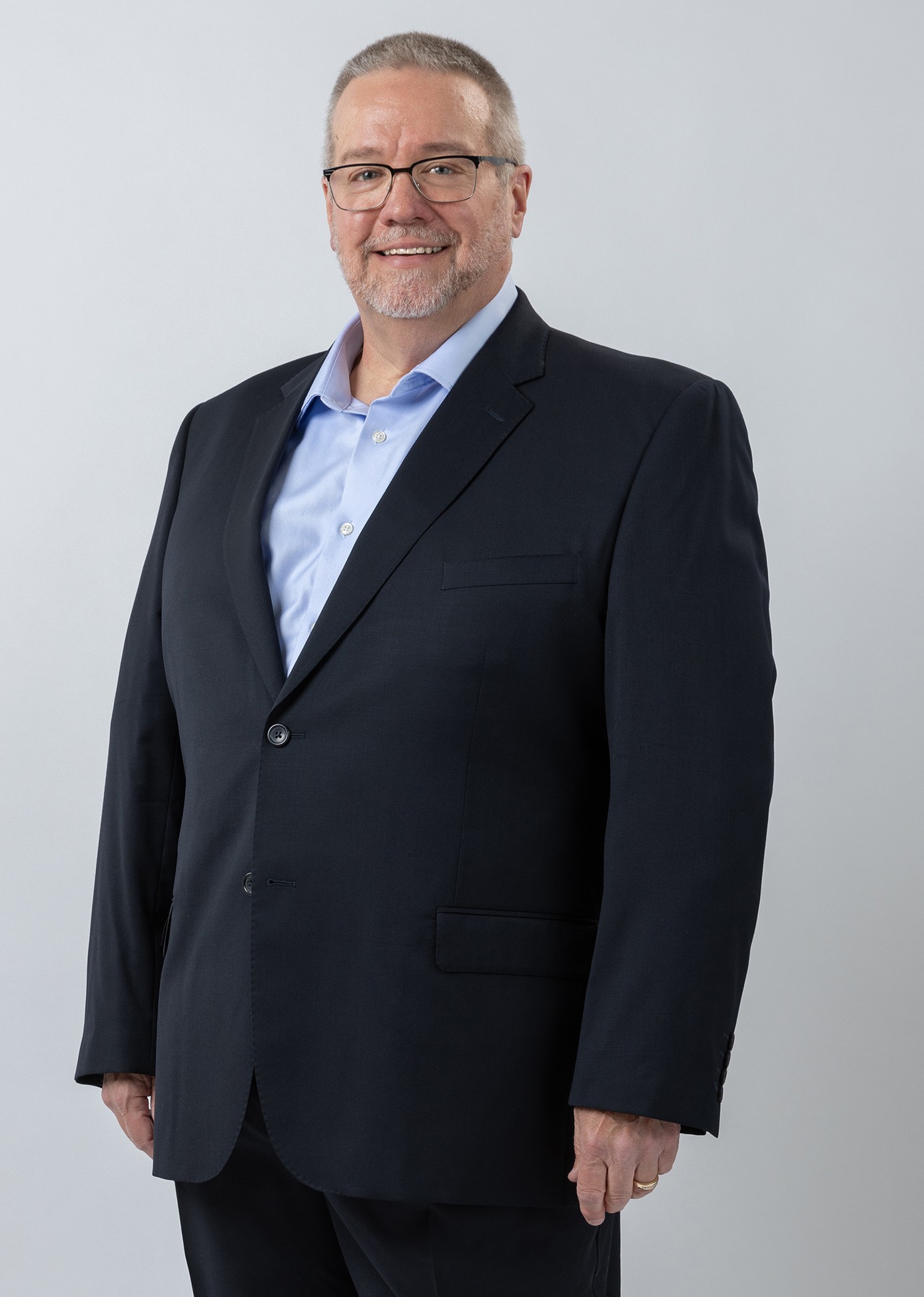 Professional headshot of Ray Riddle
