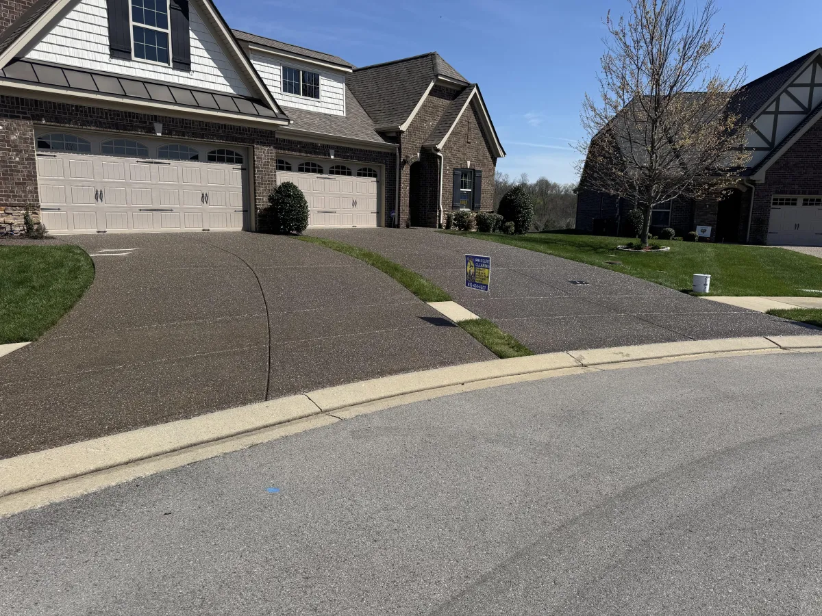 Exposed aggregate driveway freshly cleaned and sealed by Wash Wizard in Hendersonville, TN