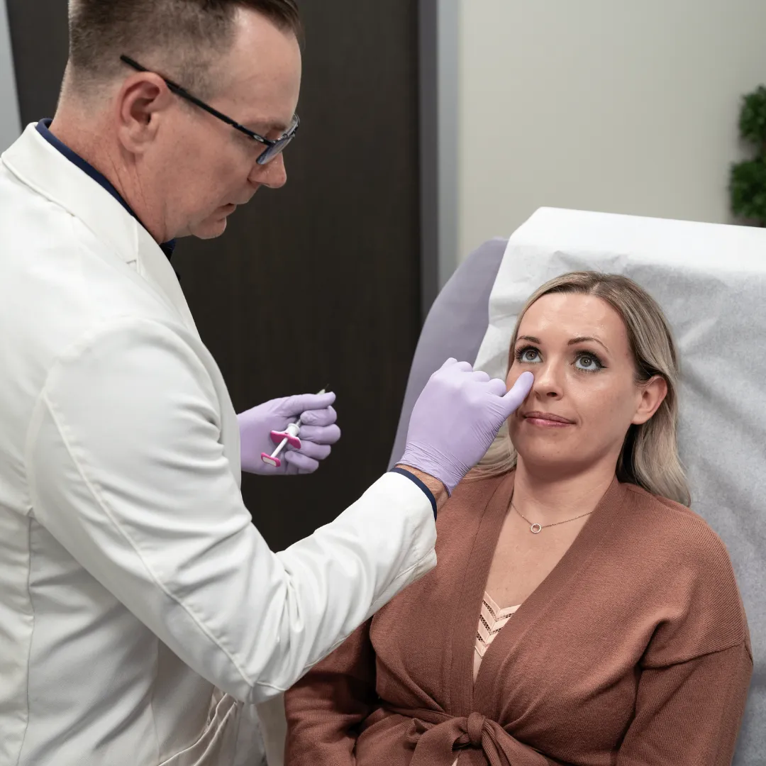 Consultant creating a custom skincare plan during DermaCare consultation