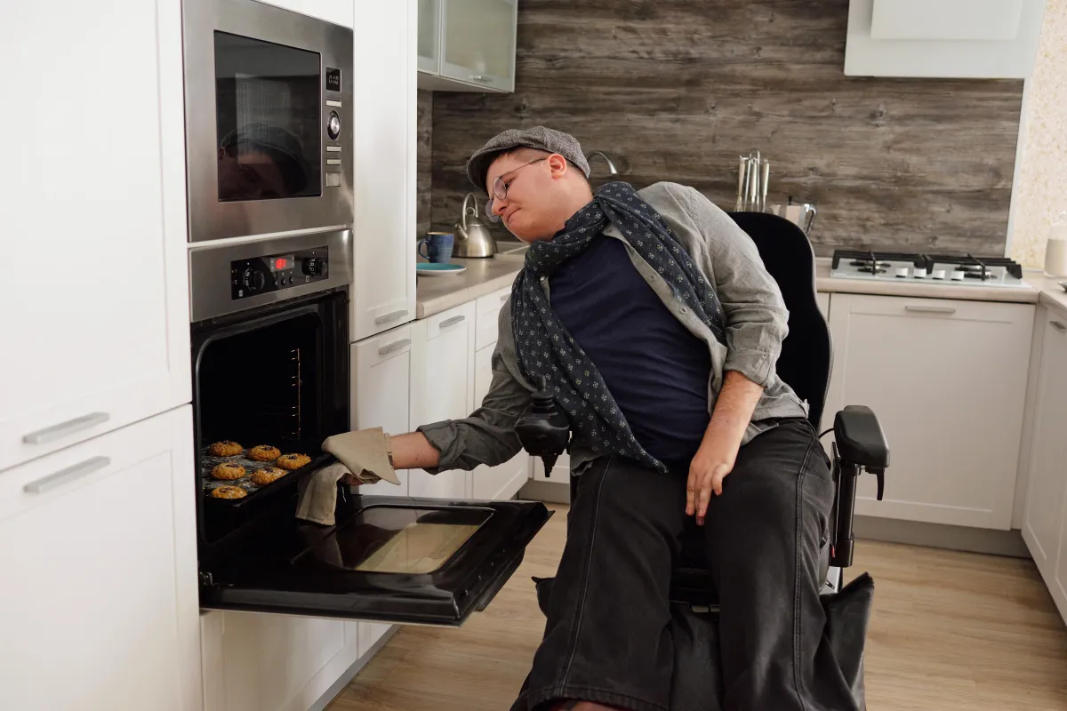 contemporary-man-with-disability-baking-cookies