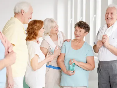 man-with-disability-getting-groceries-from-caregiver
