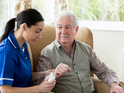 portrait-of-two-asian-senior-men-playing-chess