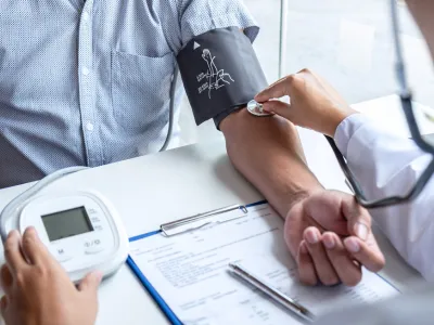 man-with-disability-getting-groceries-from-caregiver