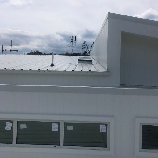 Skylight and whirly bird installation on residential metal roof in Brisbane