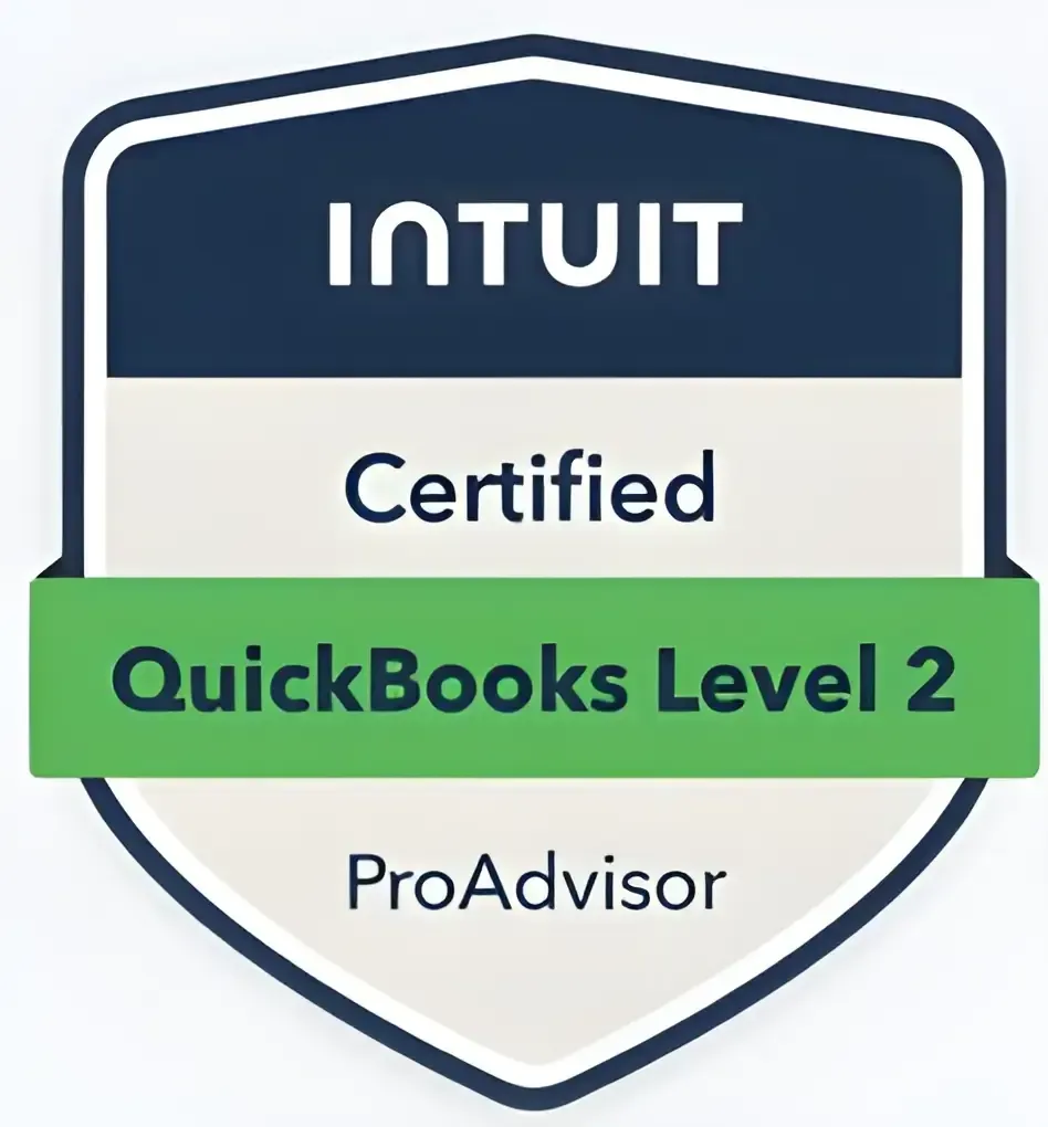 Professional accounting workspace with laptop financial reports and bookkeeping tools representing QuickBooks certified expertise from Ferrara Bookkeeping and Consulting Las Vegas bookkeeper Ina Ferrara for small and midsize businesses