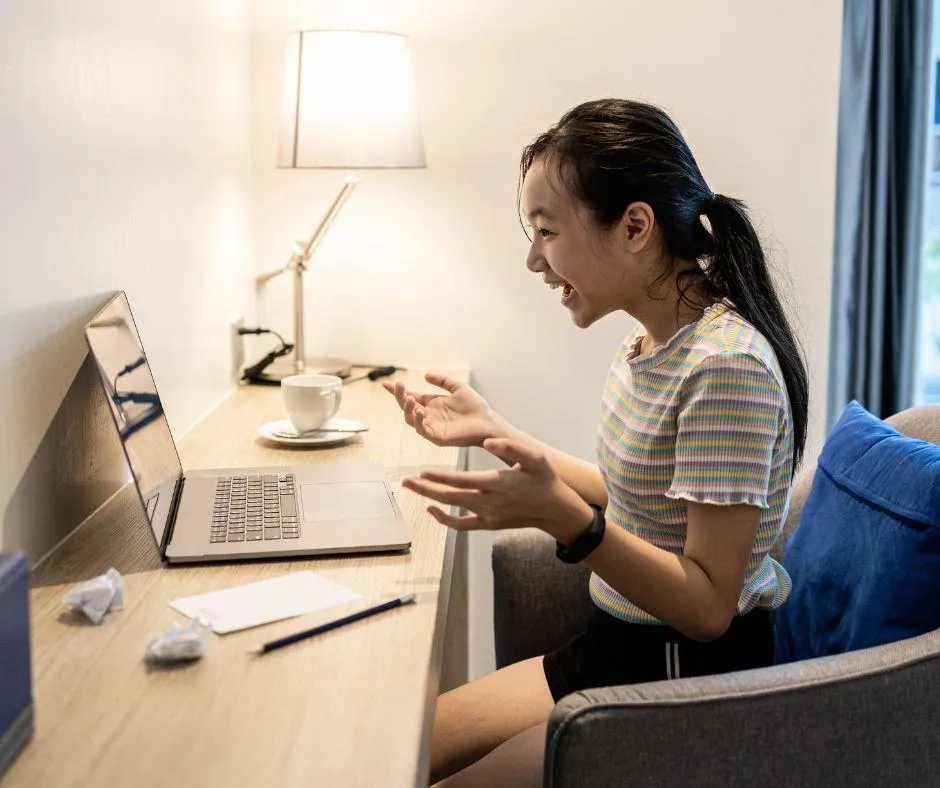 Woman filing her taxes from the comfort of her home with an expert tax professional from Digitax