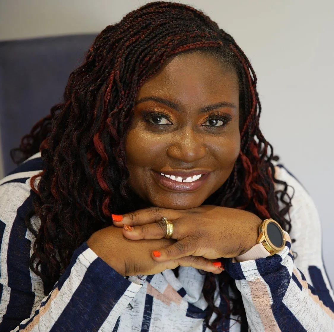 Headshot of Patience Ogunbona, client of Kim, sharing a testimonial on effective tech support and ROI-focused services.