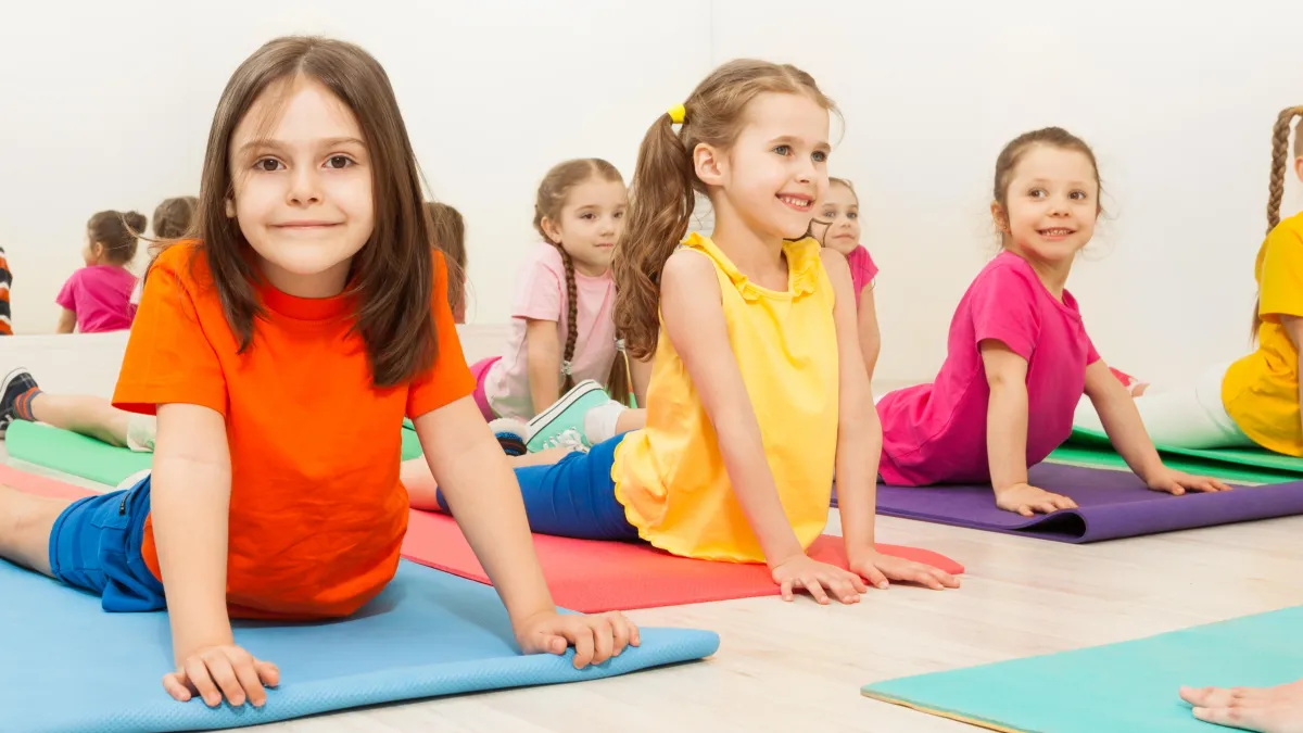 Happy Children in Gymnastics Class