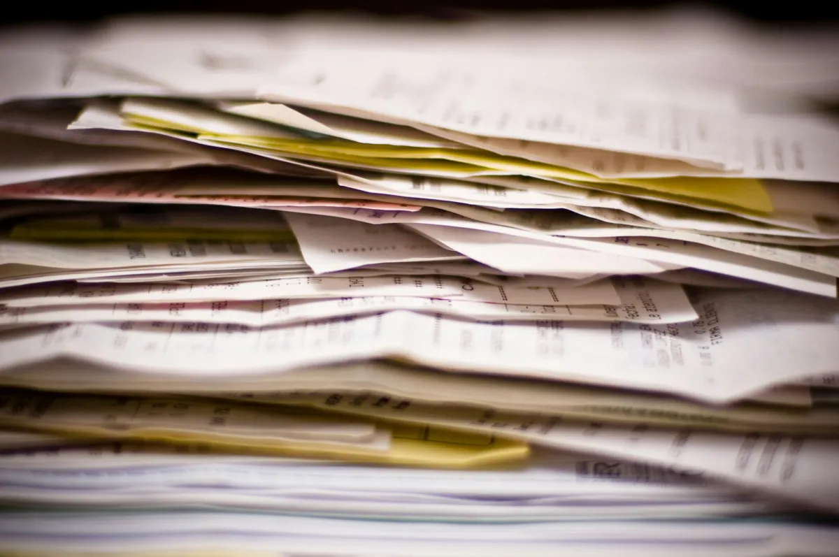 stack of disorganized and crumpled papers