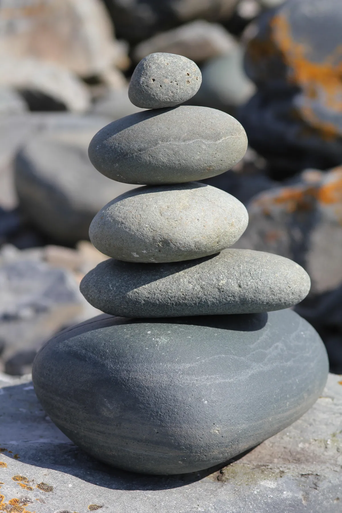 Beach rocks stacked from large to small and perfectly balanced