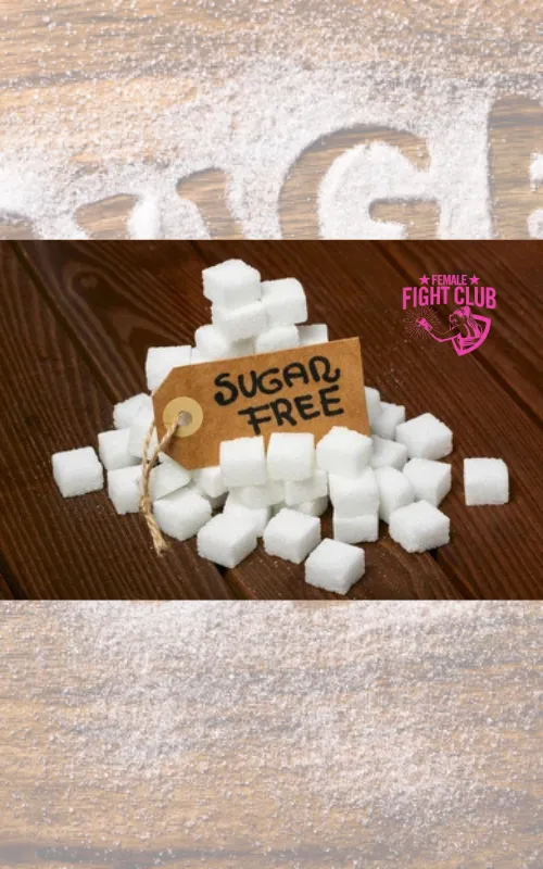 Picture a wooden background with sprinkles of sugar and 4 cubs of sugar and the word sugar free written with the sprinkles