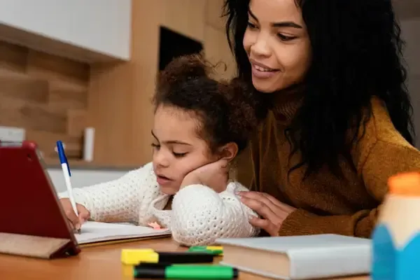 mother and daughter doing homework 