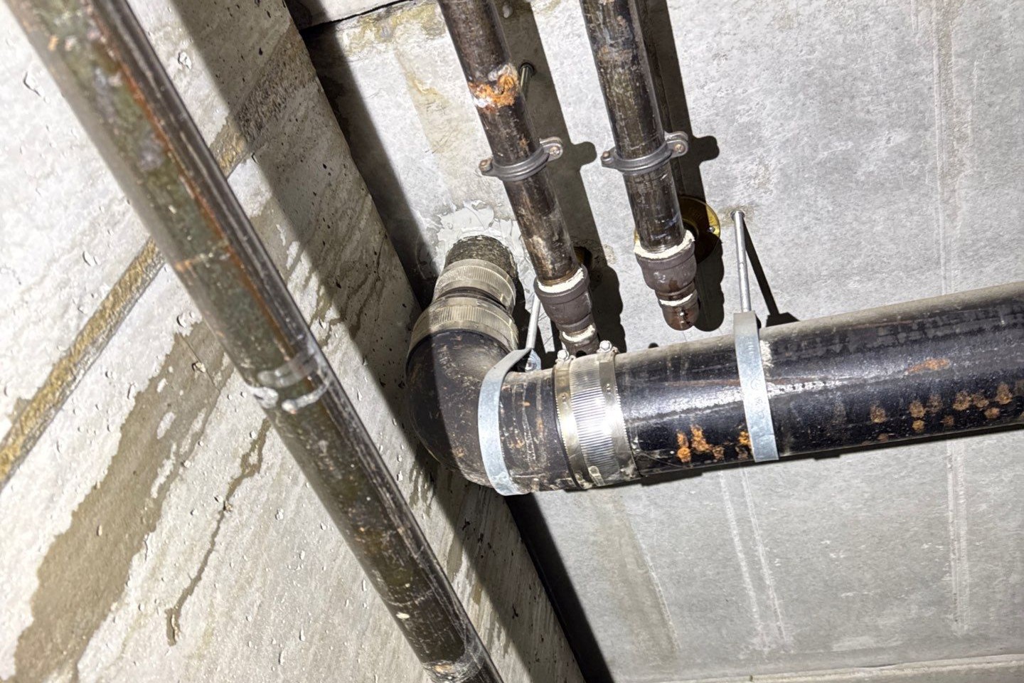 A Condominium Community Seeks Clarity on a Persistent Garage Leak in Clive, Iowa