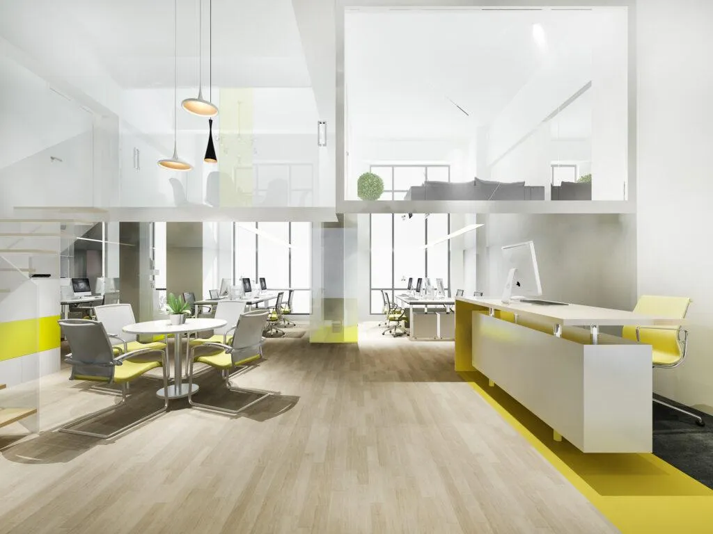 Modern open-concept commercial office space designed by B&Y Reno Corp, featuring bright interiors, glass partitions, and minimalist furniture for optimal workflow and aesthetic appeal.