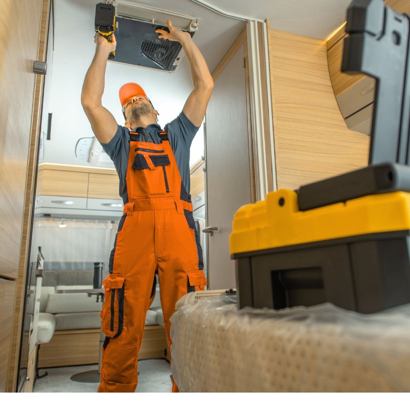 Man repairing a roof