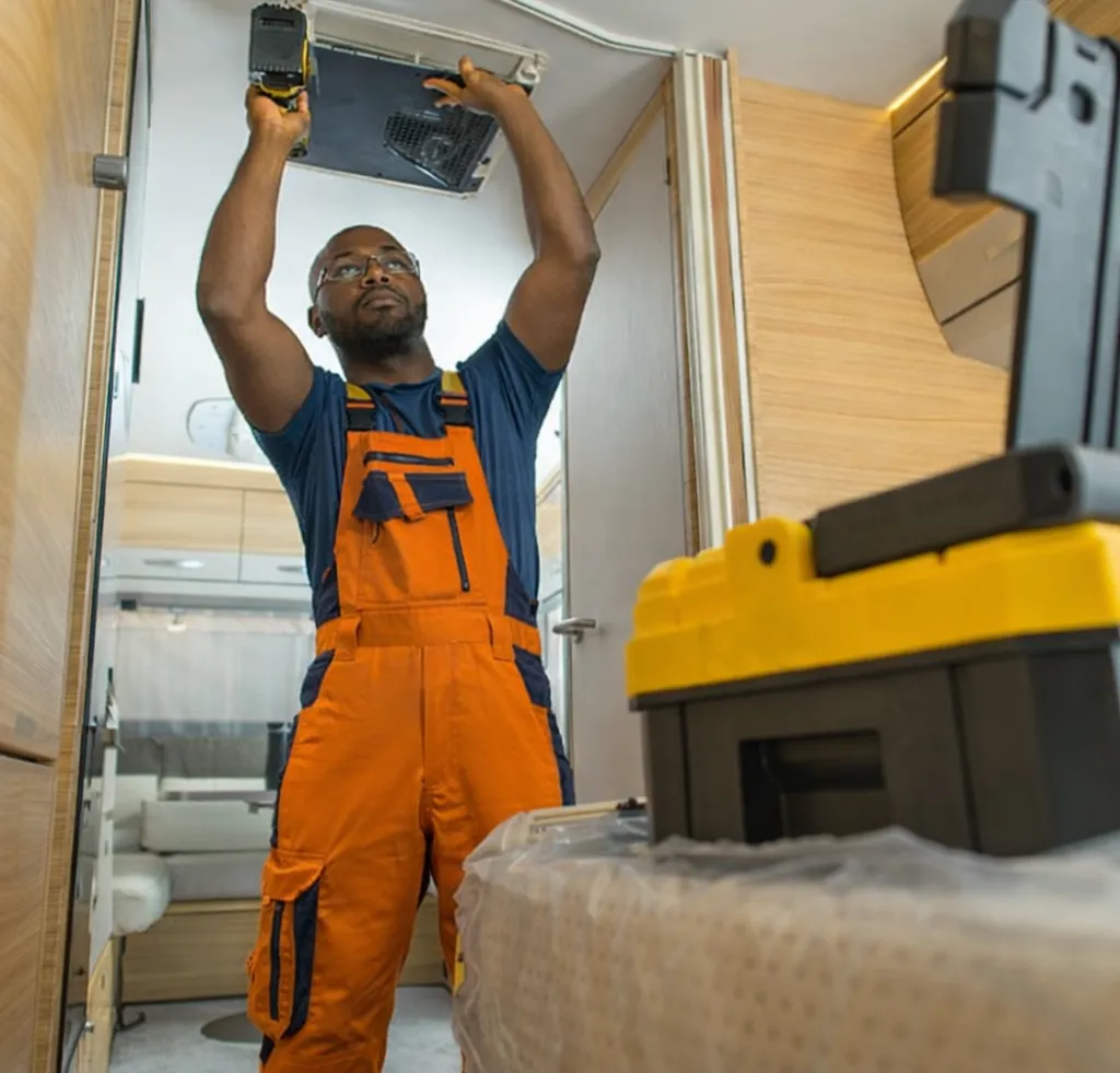 Man repairing a roof