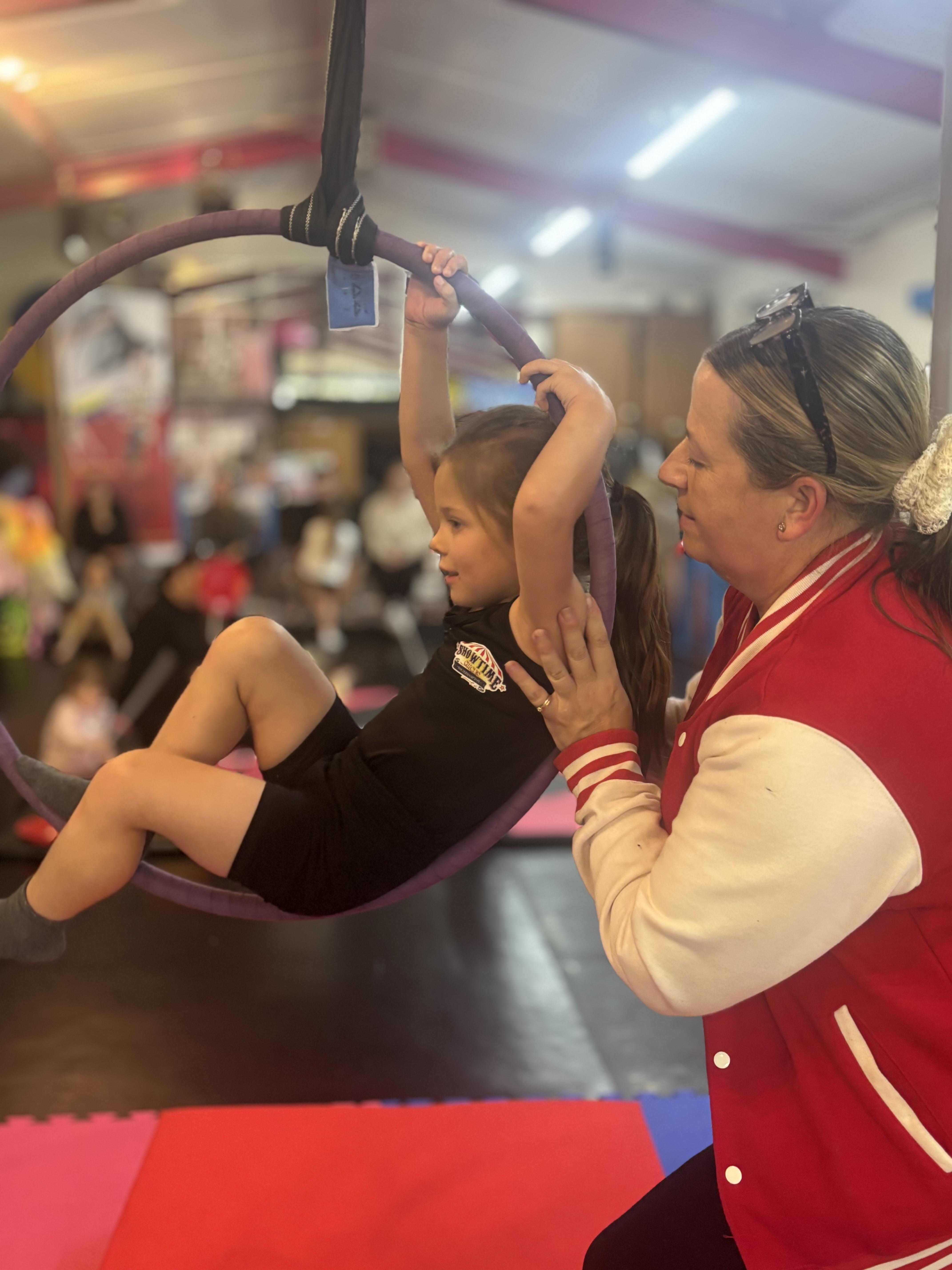 aerial hoop circus kids children teacher