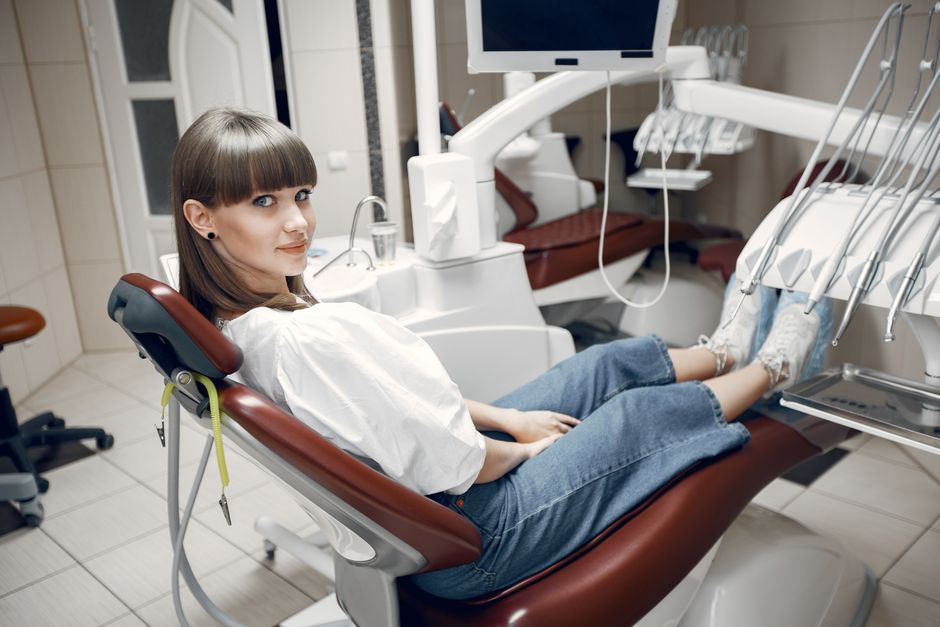 cosmetic and implant dentistry patient smiling confidently