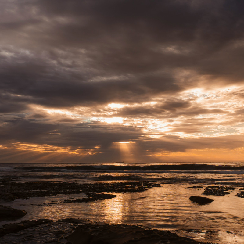 Female wealth advisor, early 50s, presenting a personalized financial plan on a digital screen to a couple, cozy office, warm lighting, 3:2 aspect ratio