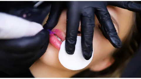 Lip blush tattoo enhancing natural lip tone and shape