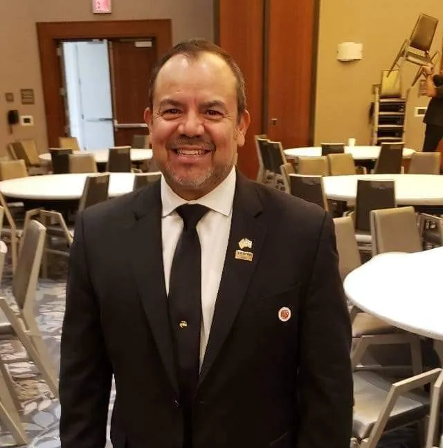 white robot near brown wall