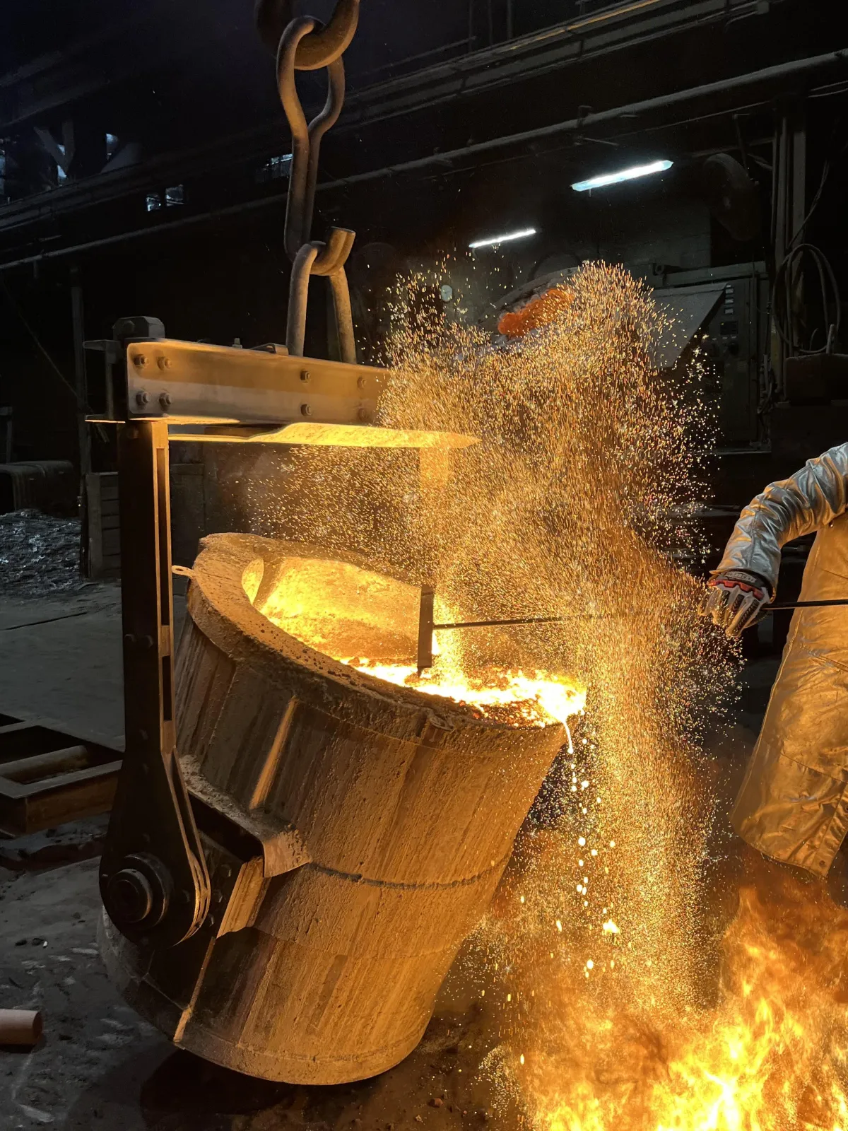 Close-up of metallurgist analyzing alloy sample in lab