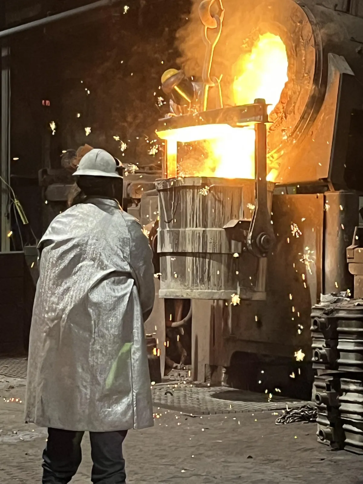 Diverse foundry team portrait in industrial setting